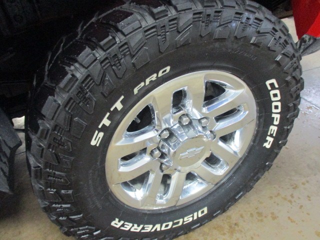 tire with white letters on an aluminum wheel