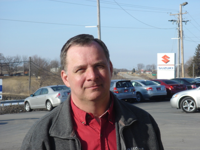 Gary Reiter of Runde Auto Group pictured here as he dreams about one day owning a Rolls Royce