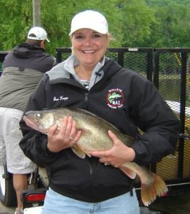 lady who was fishing and caught a big one