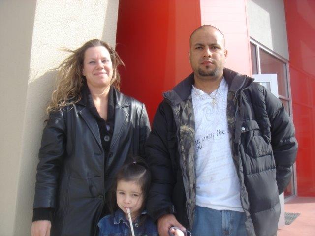 Lacey and Luis Cortes with their daughter