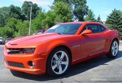 orange Chevy SS Camaro coupe at Runde Chevrolet near Dubuque