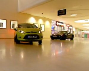 Corvette vs Ford Fiesta in a shopping mall