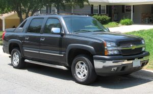 black Chevy Avalanche truck