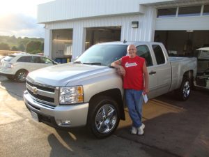 Richard pictured with his new truck before heading back to Janesville Wisconsin