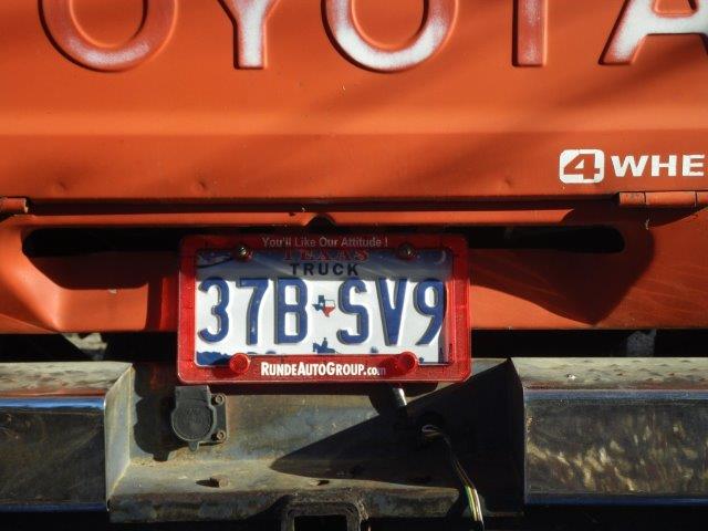 customer puts Runde license plate frame on his off road truck because of silly laws