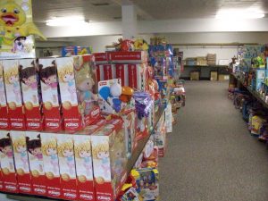 view from inside the toys for tots storage facility with boxes upon boxes of new toys