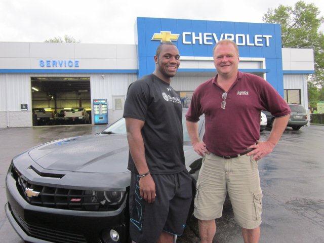 Darius Fleming pictured with his salesman, Mark "Flop" Fleege