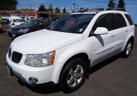 white Pontiac Torrent that you may see soon cruising around Galena