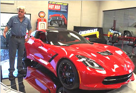 Jay Leno with his red 2014 C7 Corvette Stingray