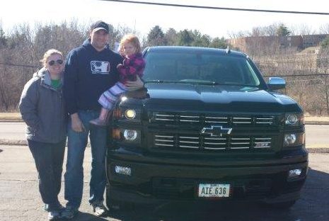 Paul Avenarius and family in front of his new Silverado