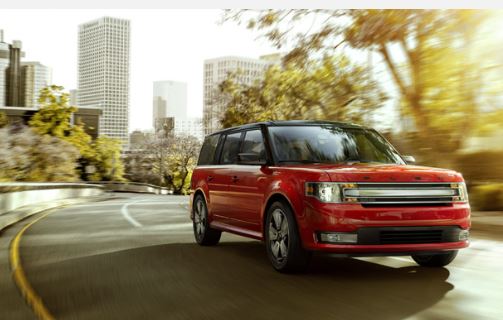 Ford Flex driving on a city street