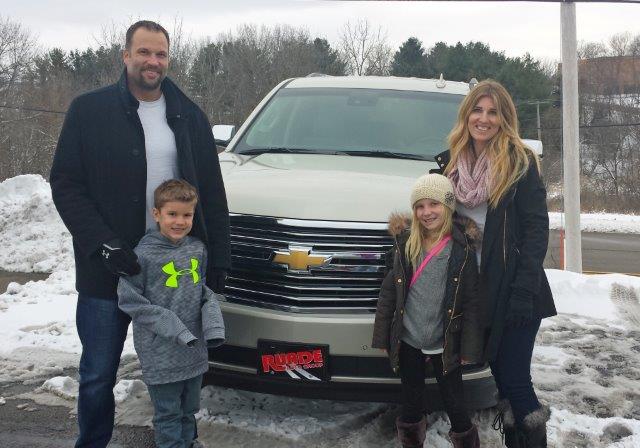 Smith Family pictured in front of their new Chevy from Runde's