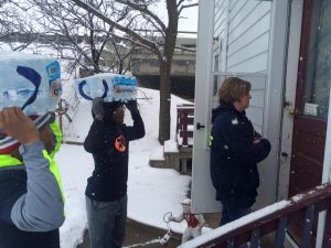 Volunteers delivering water to a residence in Flint Michigan