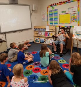 school kids reading at East Dubuque elementary school