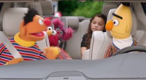 Bert and Ernie in a Chrysler Pacifica