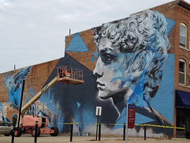 wall mural featuring a woman's face in Downtown Dubuque