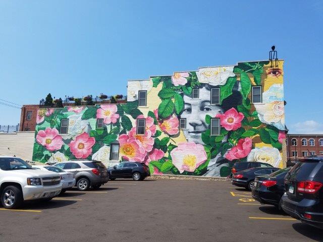 large outside mural at 345 Main St. in Dubuque