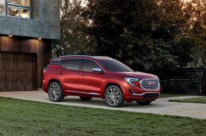 2018 red GMC Terrain Denali parked in a driveway