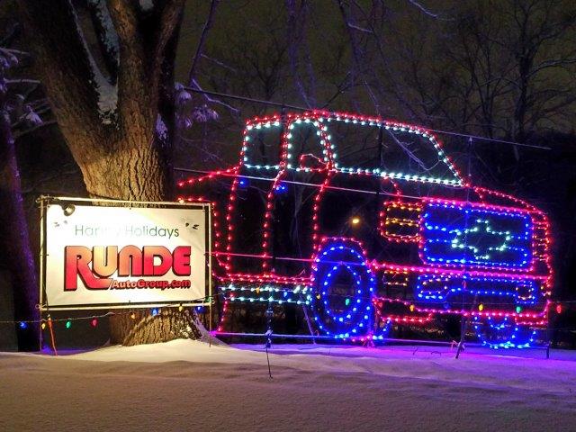 Reflections in the Park Christmas light display of a Chevy Silverado