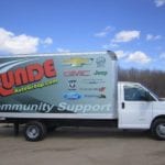 Runde Community Support truck across the river from Dubuque