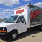 Runde Community Support truck next to Mississippi River