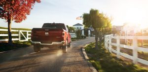 2019 Ram 1500 driving down a dirt road