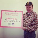 Runde Customer holding a sign for Chevrolet Making Strides Against Breast Cancer Campaign