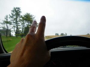 Dyersville truck driver waving 