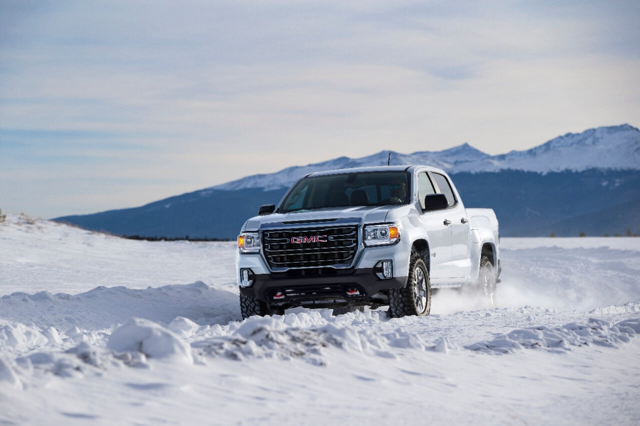 GMC Canyon AT4 driving through snow