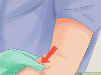 illustration of someone getting ready to have blood drawn