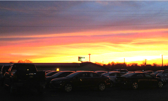 Runde PreDriven Dealership at Dusk