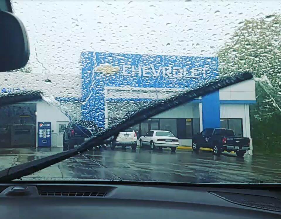 Runde Chevrolet seen through a rain coated windshield