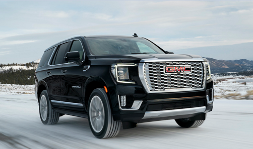 New GMC Yukon Denali on a snowy road