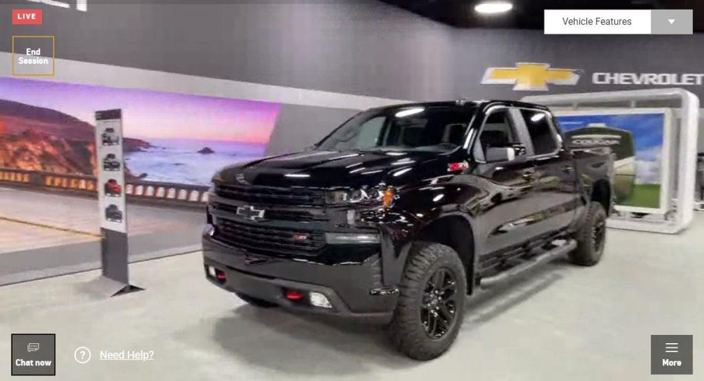 Chevy MyWay screenshot showing a black Silverado on the showroom floor