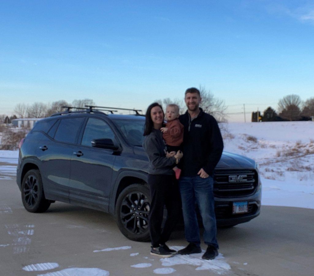 The Puls Family in front of their GMC Terrain