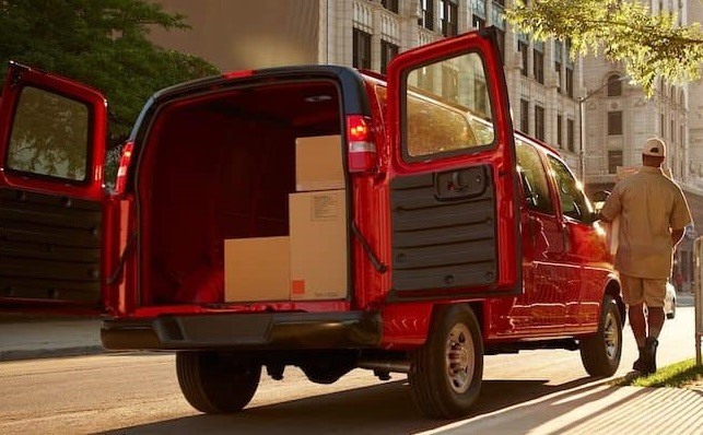 Chevy Express cargo van with rear doors open