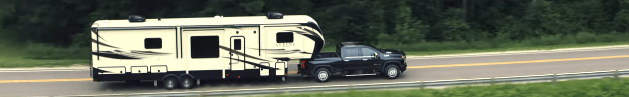 Chevy diesel truck pulling camper