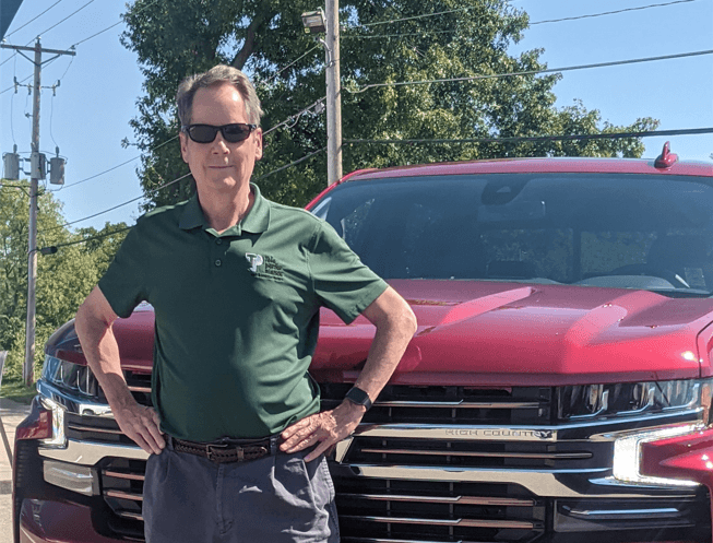 Chuck Klotz in front of his new Silverado