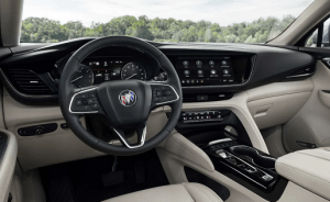 New black Buick Envision with light colored interior