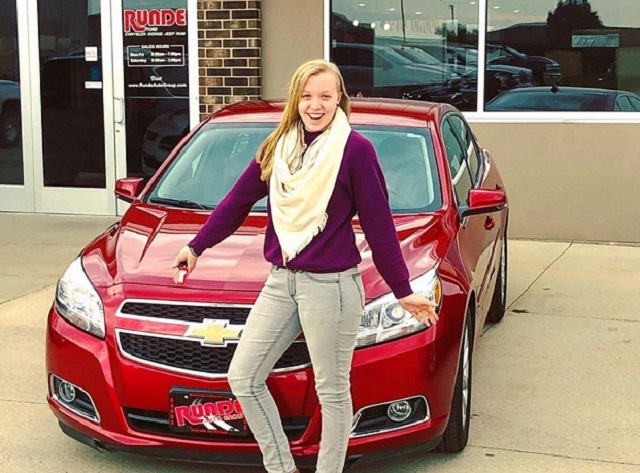 Ellen Z. from Manchester Iowa shown here with this gorgeous 2013 Chevy Malibu purchased from Runde Auto Group